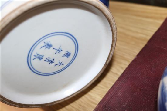 A pair of Chinese blue and white jars and cover and a pair of blue and white vases